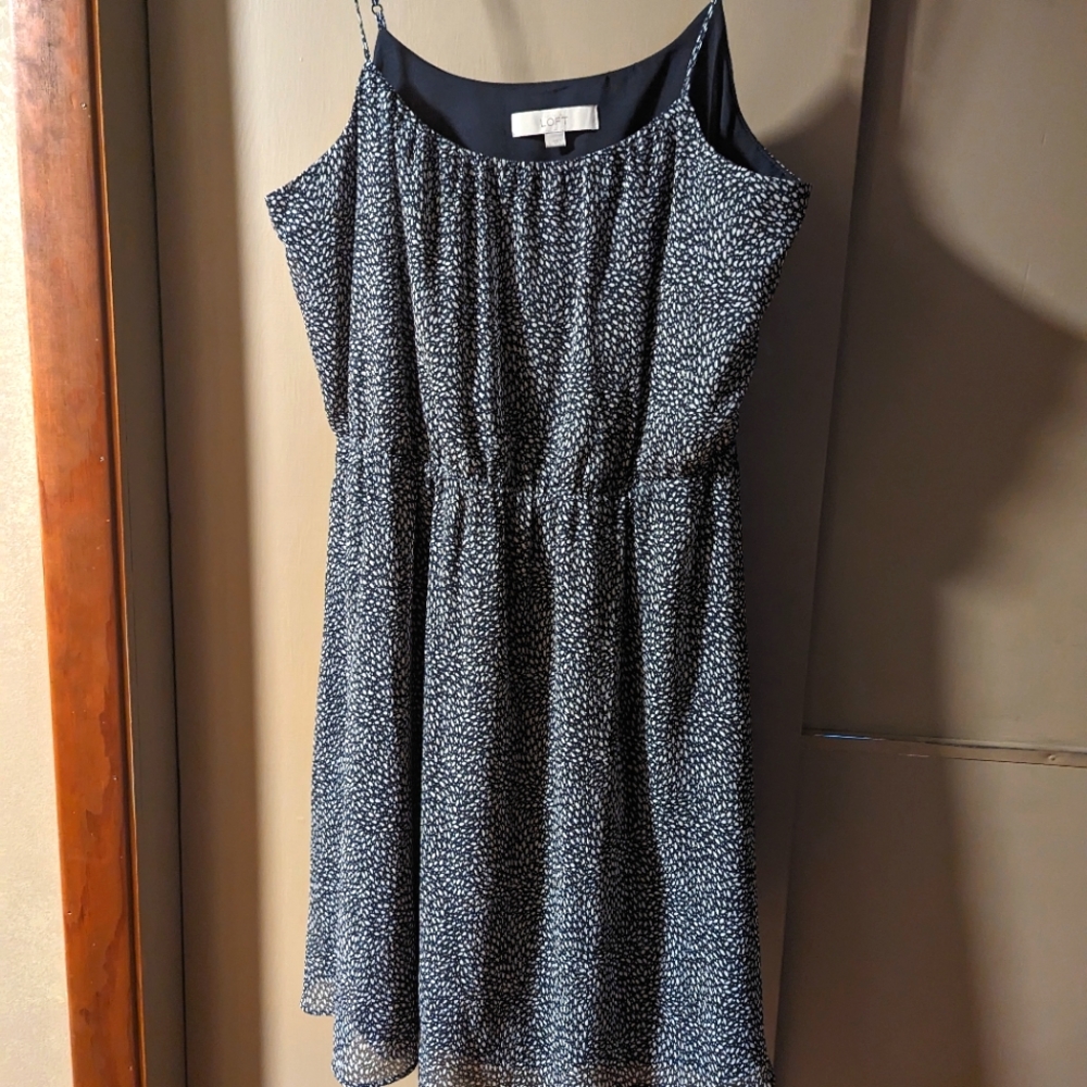 This is a pretty little party dress with spaghetti straps.